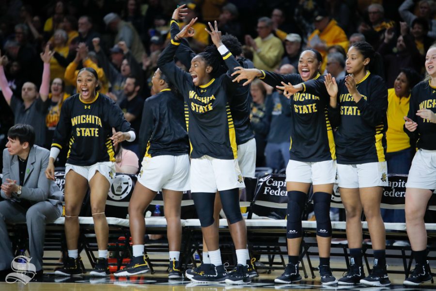 The+Wichita+State+bench+celebrates+after+Sabrina+Lozada-Cabbage+sinks+the+first+three-point+basket+during+the+game+against+UConn+on+Feb.+26%2C+2019+at+Charles+Koch+Arena.+%28Photo+by+Joseph+Barringhaus%2FThe+Sunflower.%29