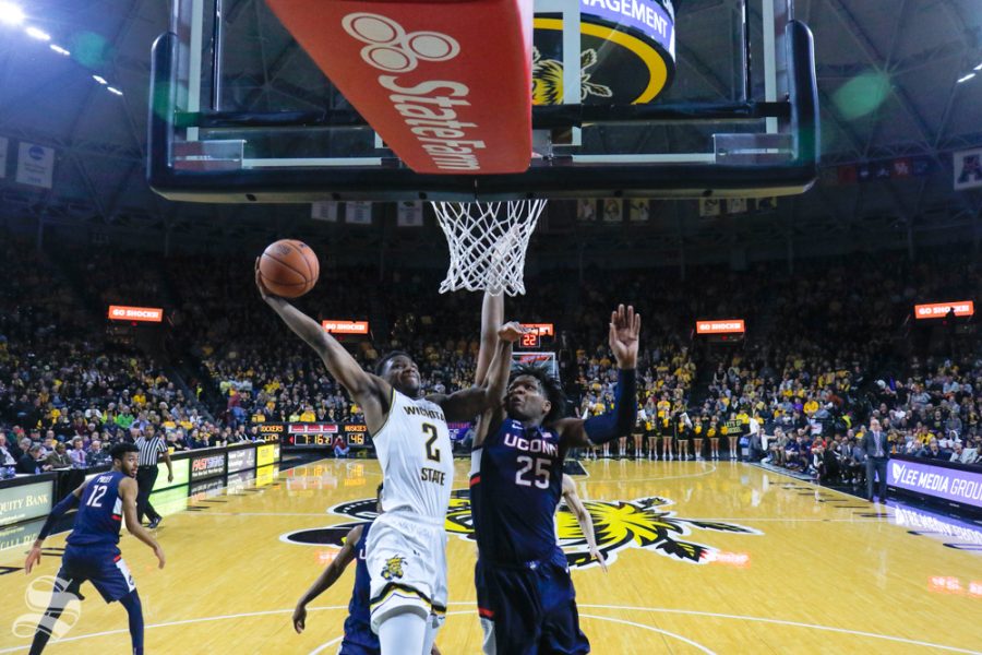 Wichita State guard Jamarius Burton goes up for a dunk in the second half of the game against UConn on Feb. 28, 2019 at Charles Koch Arena. (Photo by Joseph Barringhaus/The Sunflower.)