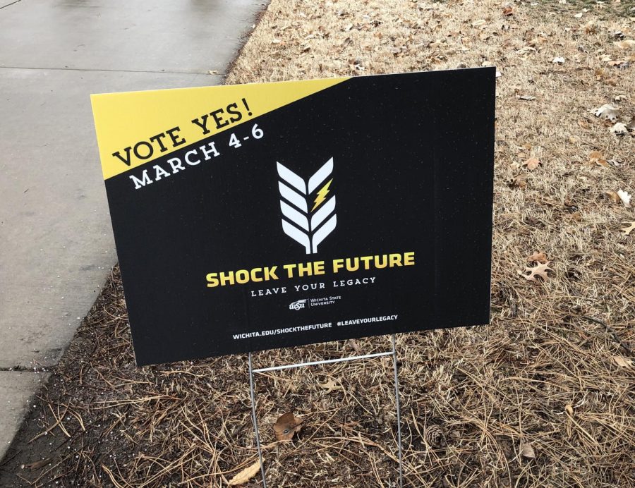 Shock the Future signs posted around campus explicitly read VOTE YES!