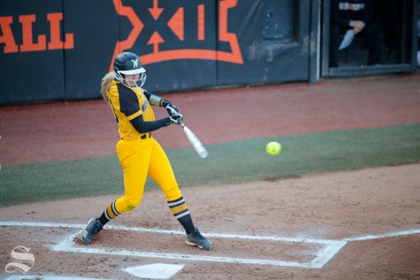 Wichita State junior Ryleigh Buck gets a hit during the game against Oklahoma State University in Stillwater, OK on March 6, 2019. (Photo by Joseph Barringhaus/The Sunflower.)