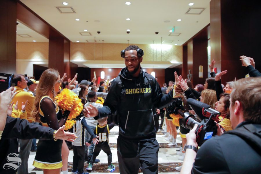Markis McDuffie walks through the lobby of the team hotel on the way to the game on March 14, 2019. (Photo by Joseph Barringhaus/The Sunflower.)
