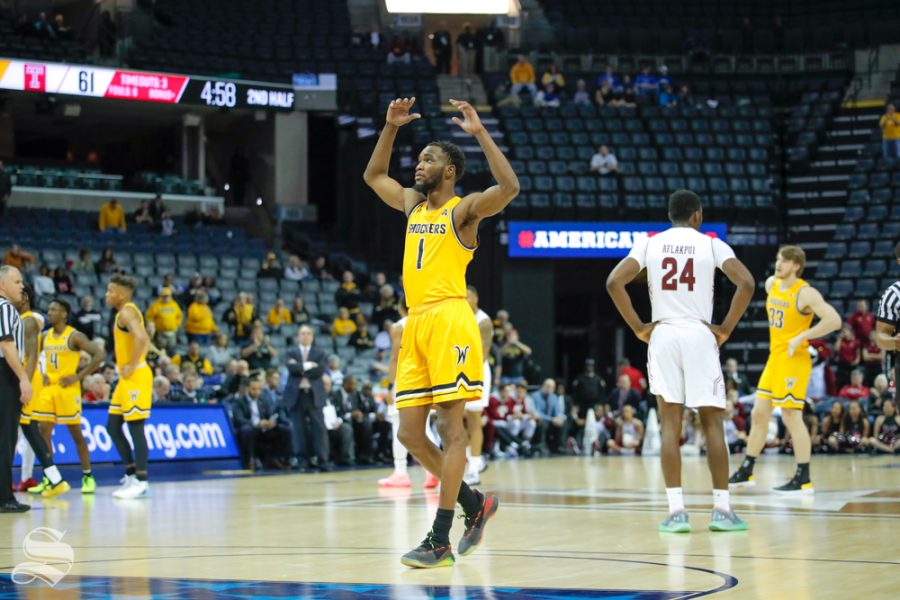 Wichita+State+forward+Markis+McDuffie+calls+for+the+fans+to+cheer+louder+during+the+second+half+of+the+game+against+Temple+on+March+15%2C+2019+at+the+FedExForum+in+Memphis%2C+Tennessee.+%28Photo+by+Joseph+Barringhaus%2FThe+Sunflower%29.