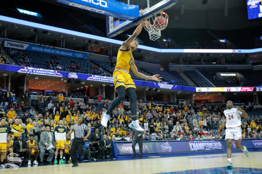 Wichita State guard Dexter Dennis dunks in the final seconds of the second half of the game against Temple on March 15, 2019 at the FedExForum in Memphis, Tennessee. (Photo by Joseph Barringhaus/The Sunflower).
