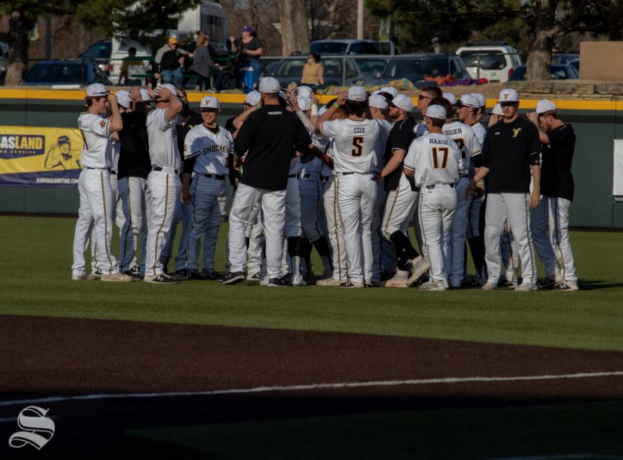 The Wichita State Baseball team prepares for their game against Kansas State on March 27 at Eck Stadium (Austin Shaw/The Sunflower.)