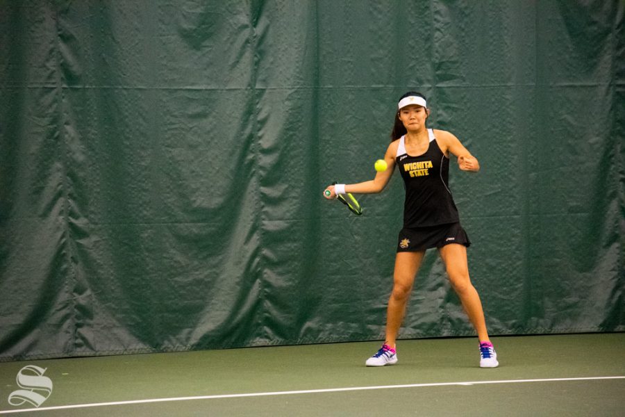 Wichita State sophomore Lingwei Kong returns the ball during their set against Oklahoma States Lisa Marie Rioux. Rioux won the match on Sunday, March 10 in the Wichita Country Club tennis complex. (Photo by Easton Thompson/The Sunflower)