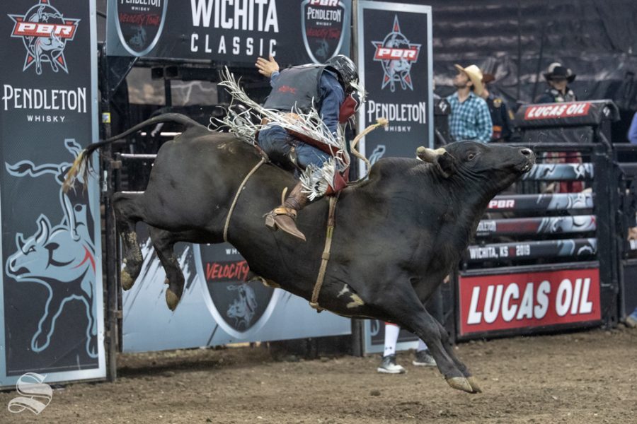 Cristiano Figueredo rides Mo Bama for 4.29 seconds in the first round at the PBR Pendleton Whisky Velocity Tour on April 13, 2019 at INTRUST Bank Arena. (Photo by Joseph Barringhaus/The Sunflower).