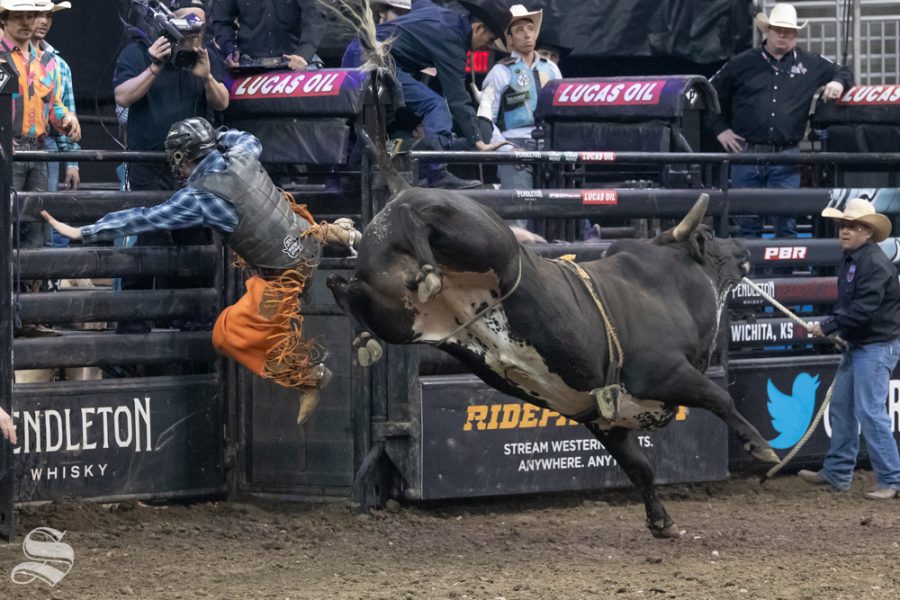 Tristen Marshall rides Gangster Face for 1.94 seconds in the first round at the PBR Pendleton Whisky Velocity Tour on April 13, 2019 at INTRUST Bank Arena. (Photo by Joseph Barringhaus/The Sunflower).