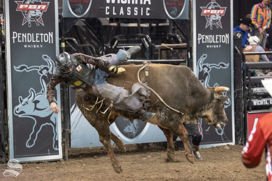 Dalton Rudman falls off Proctors Pride at 2.62 seconds during the first round of the PBR Pendleton Whisky Velocity Tour on April 13, 2019 at INTRUST Bank Arena. (Photo by Joseph Barringhaus/The Sunflower).