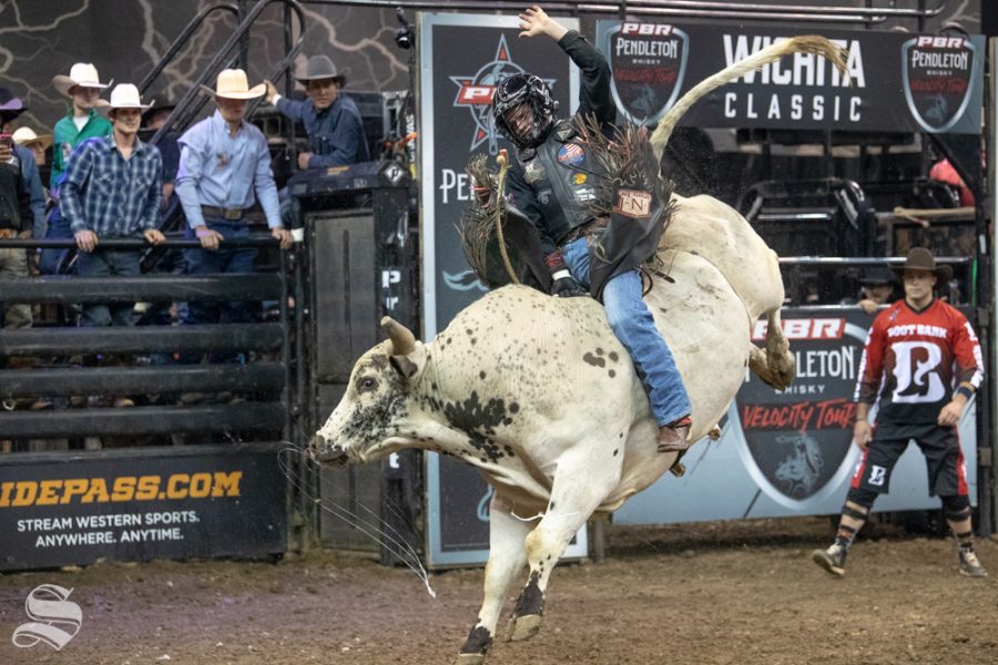 Michael Lane rides Excessive Force for 6.12 seconds during the first round of the PBR Pendleton Whisky Velocity Tour on April 13, 2019 at INTRUST Bank Arena. (Photo by Joseph Barringhaus/The Sunflower).
