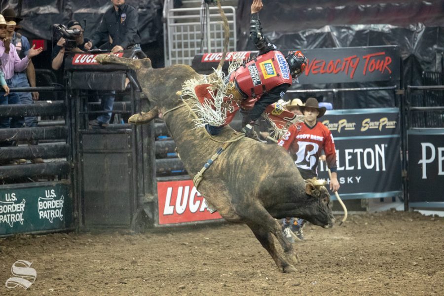 Alex Cardozo holds onto Air Assault for 3.79 seconds during the first round of the PBR Pendleton Whisky Velocity Tour on April 13, 2019 at INTRUST Bank Arena. (Photo by Joseph Barringhaus/The Sunflower).