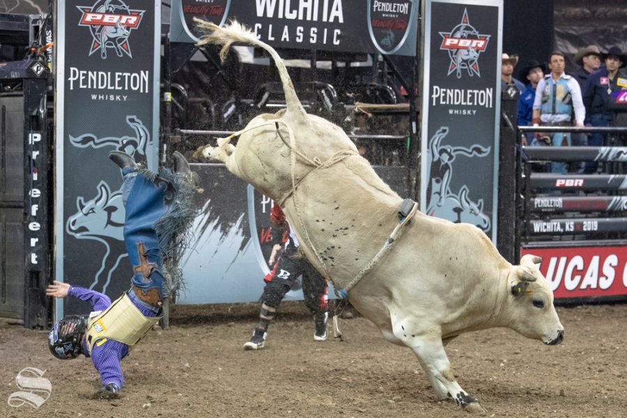 Cody Rodeo Tyler is bucked off Sniper at 4.20 seconds during the first round of the PBR Pendleton Whisky Velocity Tour on April 13, 2019 at INTRUST Bank Arena. (Photo by Joseph Barringhaus/The Sunflower).