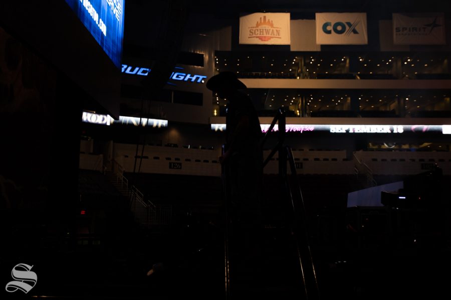 A bull rider stands on top of the chute prior to the start of the PBR Pendleton Whisky Velocity Tour on April 13, 2019 at INTRUST Bank Arena.