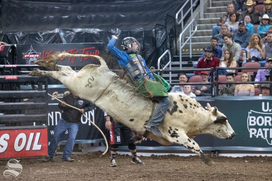 Josh Frost holds onto Try Me for 3.96 seconds during the first round of the PBR Pendleton Whisky Velocity Tour on April 13, 2019 at INTRUST Bank Arena. (Photo by Joseph Barringhaus/The Sunflower).