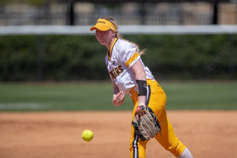 Wichita State sophomore Caitlin Bingham throws a strike during the game against Tulsa on April 27, 2019 at Collins Family Softball Complex in Tulsa, Oklahoma. (Photo by Joseph Barringhaus/The Sunflower).