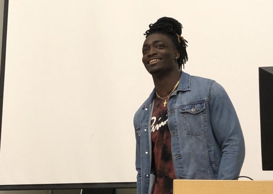 Wichita native Davontae Harris speaks during a Black Student Union meeting Thursday. Harris was drafted by the Cincinnati Bengals in 2018.
