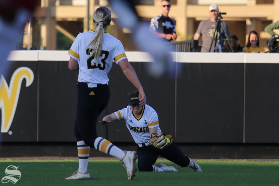 Wichita States Wylie Glover fields a pop-out to center field. She completed the diving catch. No. 1 Oklahoma defeated Wichita State 8-0 in five innings on April 24 at Wilkins Stadium. (Photo by Evan Pflugradt/The Sunflower).