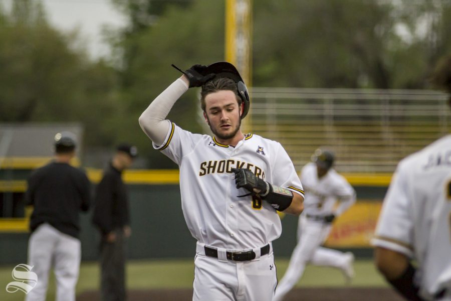 Wichita State freshman Jack Sigrist jogs home after a home run during the game against OU on April 23, 2019 at Eck Stadium.