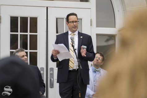 Liberal arts and sciences dean Andrew Hippisley speaks at the rededication of Fiske Hall on May 3, 2019.