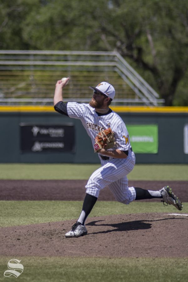 Wichita State junior Preston Snavely pitches during the game against ECU on May 12, 2019 at Eck Stadium.