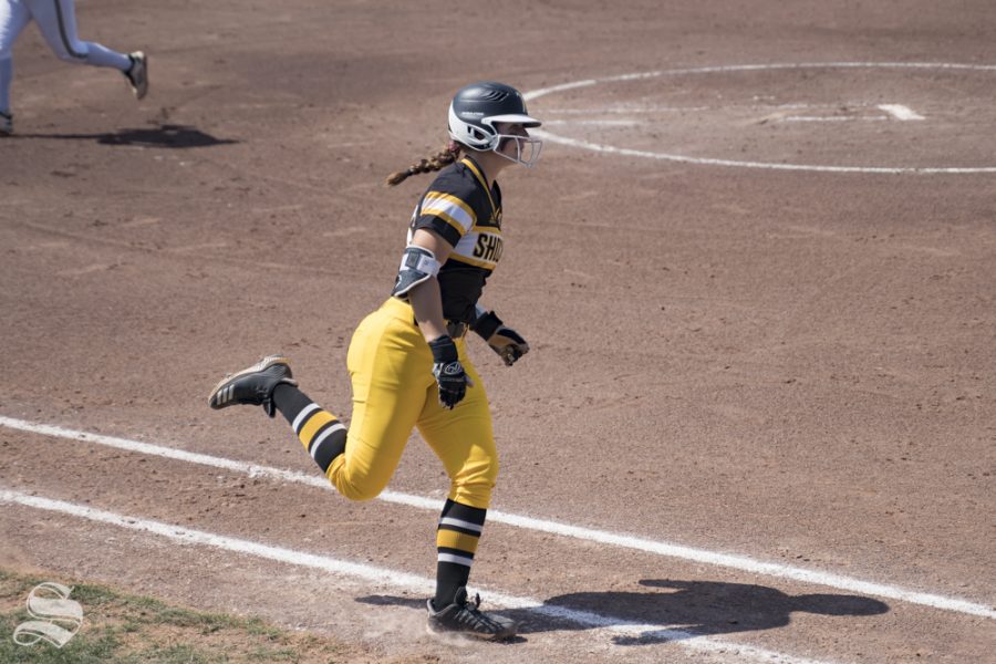 Wichita State freshman Sydney Mckinney runs to first base during the game against USF at Wilkins Stadium on May 4, 2019.