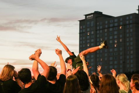 A fan crowd-surfs during The Cavves at Riverfest on Thursday, June 6.