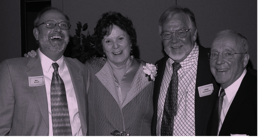 Carol Konek poses for a photo at her retirement dinner in 2005 with Bill Bischoff, John Koppenhaver and Paul Magelli. This photo originally appeared in the LAS Newsletter in fall 2005. 