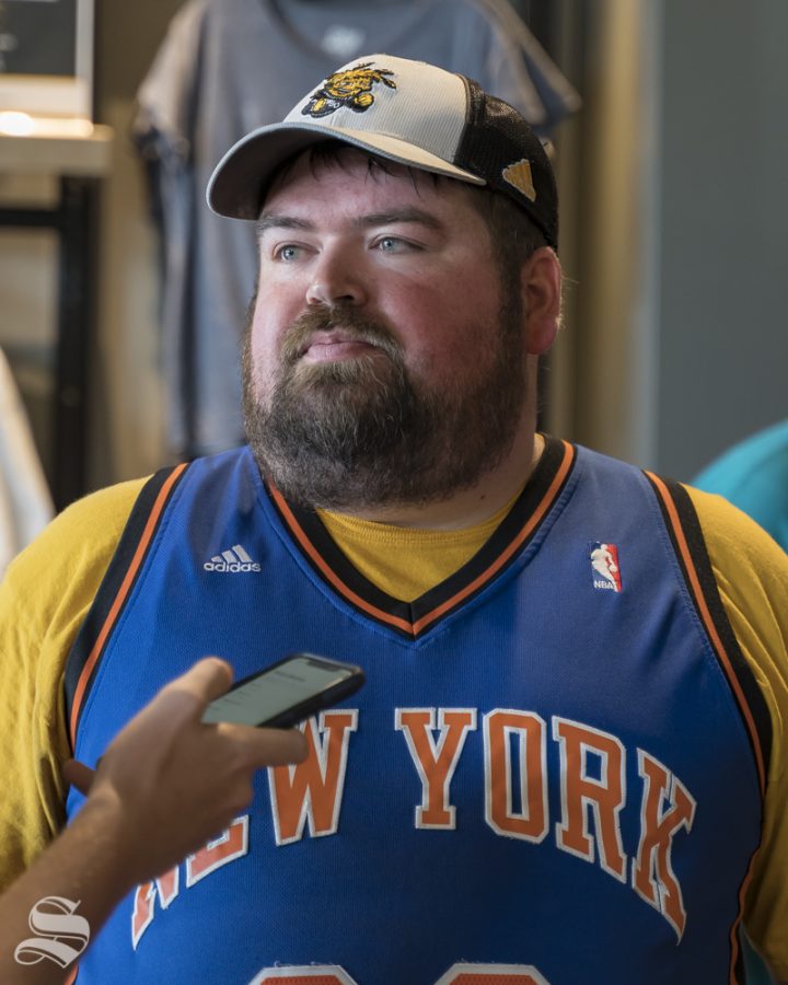 Russell Lowden had on a Toure Murry's signed Knicks jersey. Russell was among many other fans at Aftershocks's autograph signing event at Shocker Store on July 21, 2019.