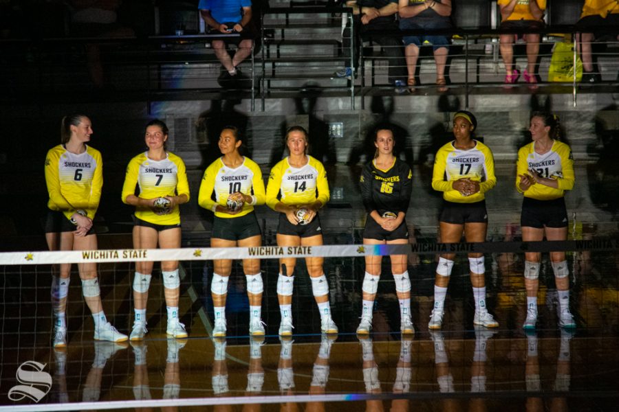 Shockers starting lineup prepares for their first set against Kansas University on Aug. 17 in Charles Koch Arena.