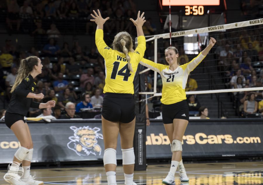 Wichita State redshirt sophomore Megan Taflinger celebrates with teammates after scoring against KU on August 17 at Koch Arena.