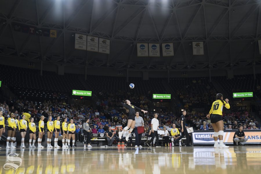 Wichita State senior Kara Bown serves the ball during the exhibition game against KU on August 17 at Koch Arena.