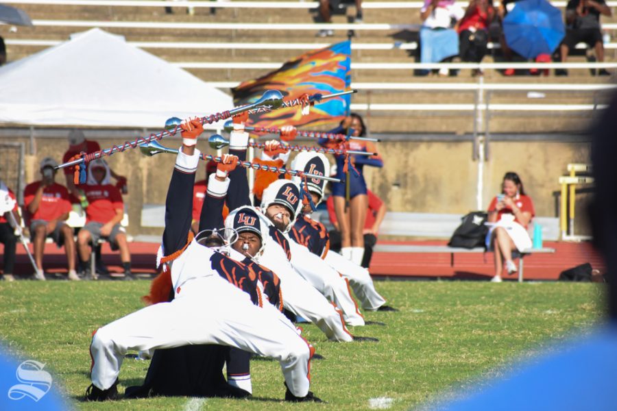 Langston Universitys marching band section leaders lean in formation during their halftime performance on Sept. 7.