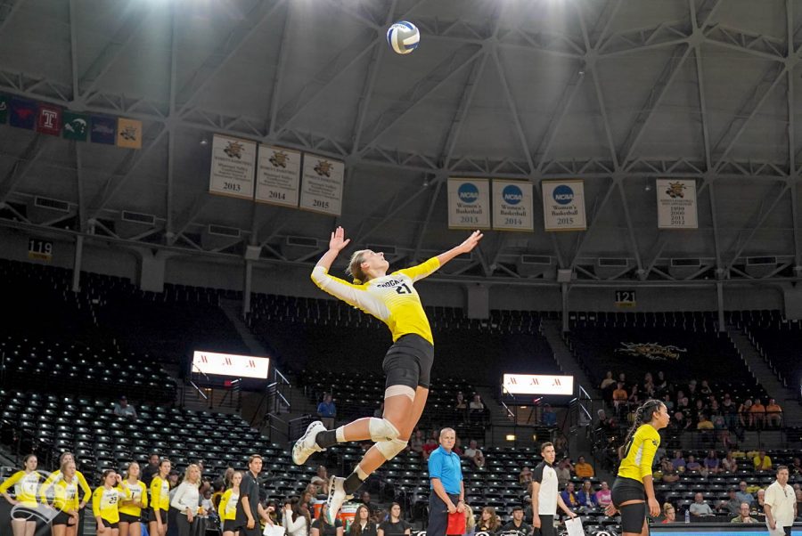 Wichita+State+sophomore+Megan+Taflinger+goes+up+for+a+serve+during+the+Shockers+match+against+Cincinnati+on+Sunday+inside+Charles+Koch+Arena.