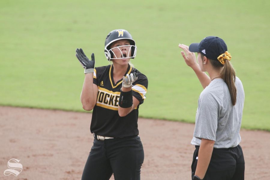 Wichita States Ryleigh Buck celebrates after getting on base against Central Oklahoma during their scrimmage on Saturday, Sept. 28, 2019.