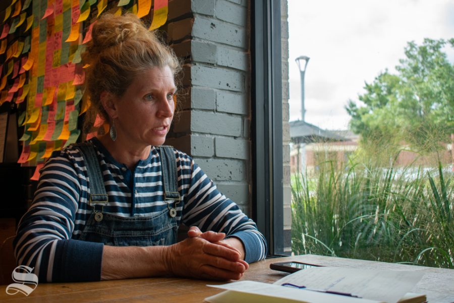 Stephanie Merritt responds to a question about ICT Food Rescue during an interview with The Sunflower on Sept. 24 at the Starbucks in Braeburn Square. Merritt founded the non-profit organization which rescues leftover food from businesses and provides the food to those in need.