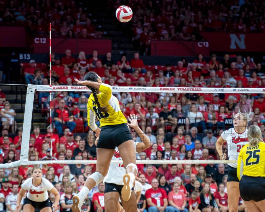 Wichita Sate freshman Sina Uluave goes up for a kill against No. 1 Nebraska on Saturday in Lincoln, Nebraska.