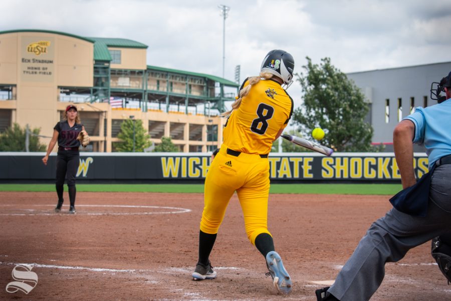 Wichita State sophomore Caitlin Bingham swings to make contact with the ball during their game against Southern Nazarene on Sept. 21 at Wilkins Stadium.
