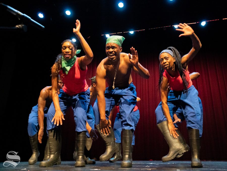 Members of Step Afrika! performing the African Gumboot dance. The origin of this dance began in Africa.