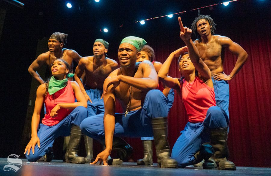 Members of Step Afrika! look at the crowd. They are ranked as one of the top ten African-American dancing companies in the U.S.
