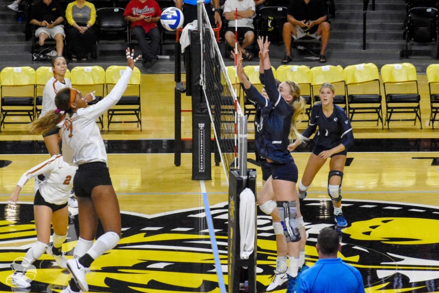 Texas Orie Agbaji goes up for a kill during the Shocker Classic on Friday inside Charles Koch Arena.