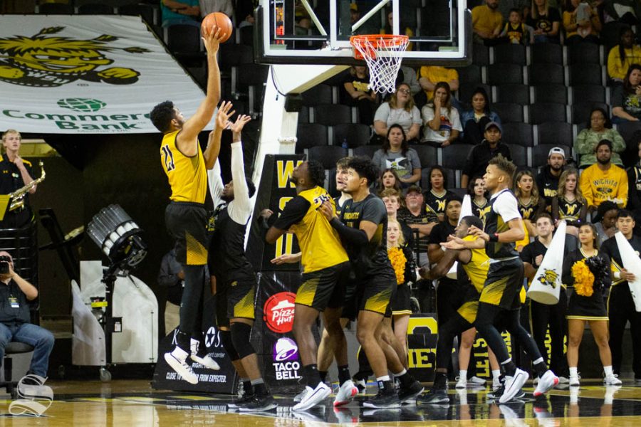 Wichita State senior Jaime Echenique goes up for a hook shot during the Black and Yellow Scrimmage on Saturday inside Charles Koch Arena.