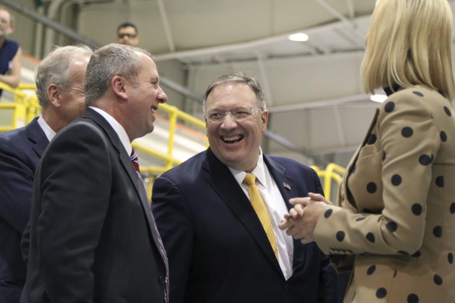 Secretary of State Mike Pompeo laughs Thursday during a tour of Textron Aviation East. He and Ivanka Trump visited the site as part of their trip to Wichita on Thursday, Oct. 24, 2019. 