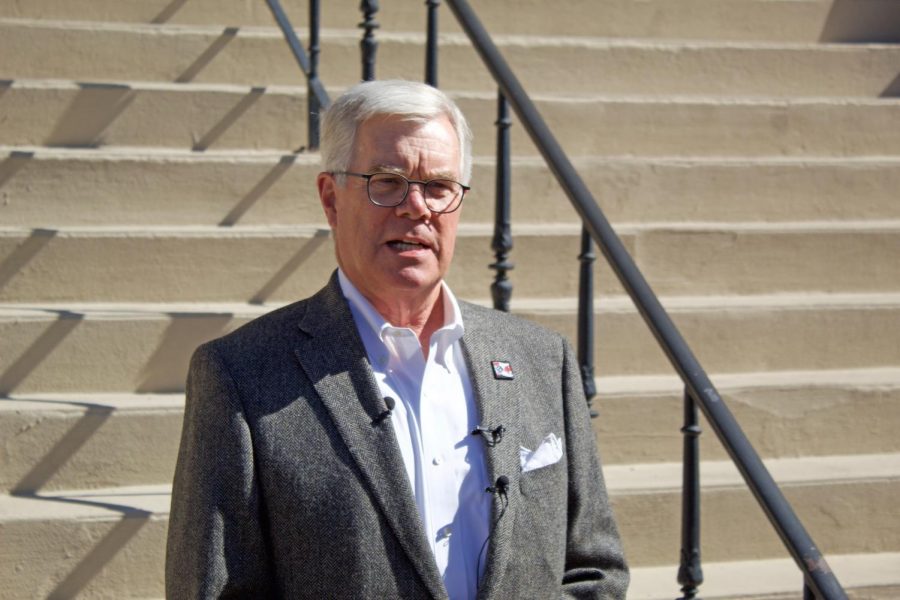 Lyndon Lyndy Wells announces his write-in candidacy on Thursday for the Nov. 5 mayoral election in front of the Sedgwick County Historic Courthouse. The former banker and chair of the WSU Tech Industry Advisory Board was urged to run by Kansas Regent Jon Rolph and former mayors Bob Knight and Carl Brewer. 