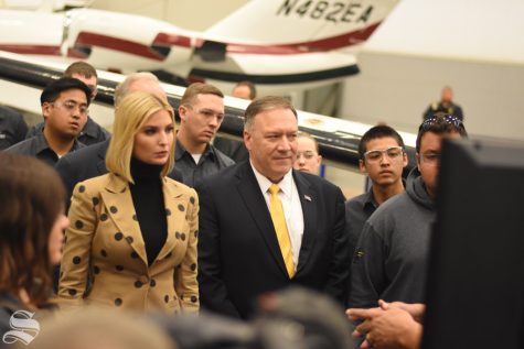 Mike Pompeo and Ivanka Trump stand with WSU aviation students during a tour of WSU Tech on Oct. 24. 
