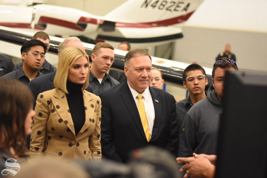 Mike Pompeo and Ivanka Trump stand with WSU aviation students during a tour of WSU Tech on Oct. 24.