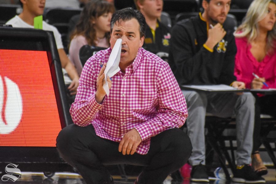 Head Coach Chris Lamb yells out instructions to team members during the last set of the game against the USF Bulls on Oct. 20.