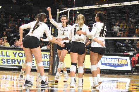 Freshman Brylee Kelly celebrates with her teammates after scoring against the Houston Cougars on Oct. 11.