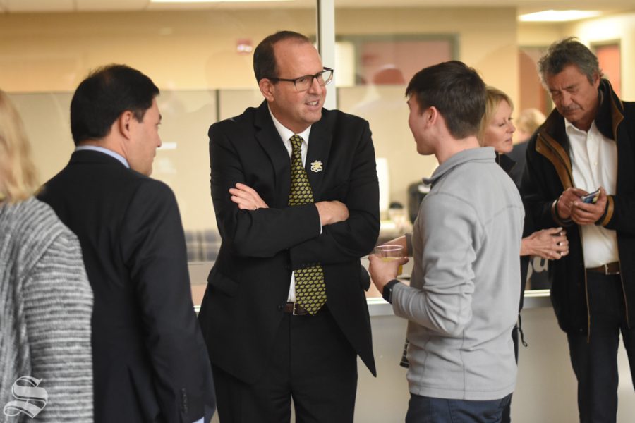 New President Jay Golden speaks to sophomore Drue Owen after his public address on Thursday, Oct. 31 in the RSC.