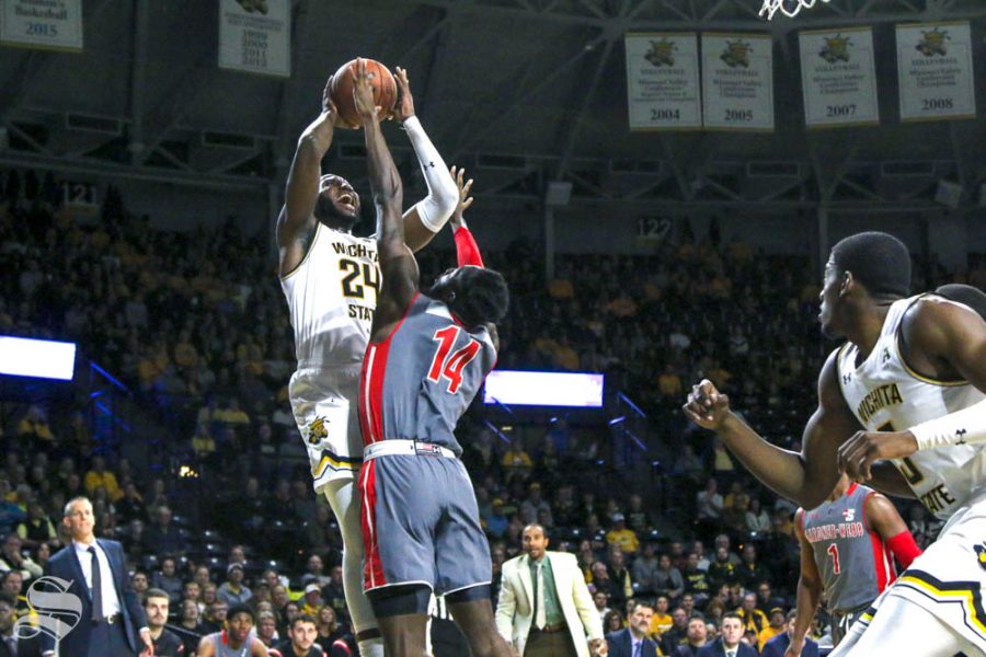 Wichita State sophomore Morris Udeze goes up for a contested shot during the game against Gardner-Webb on Nov. 19 inside Charles Koch Arena.