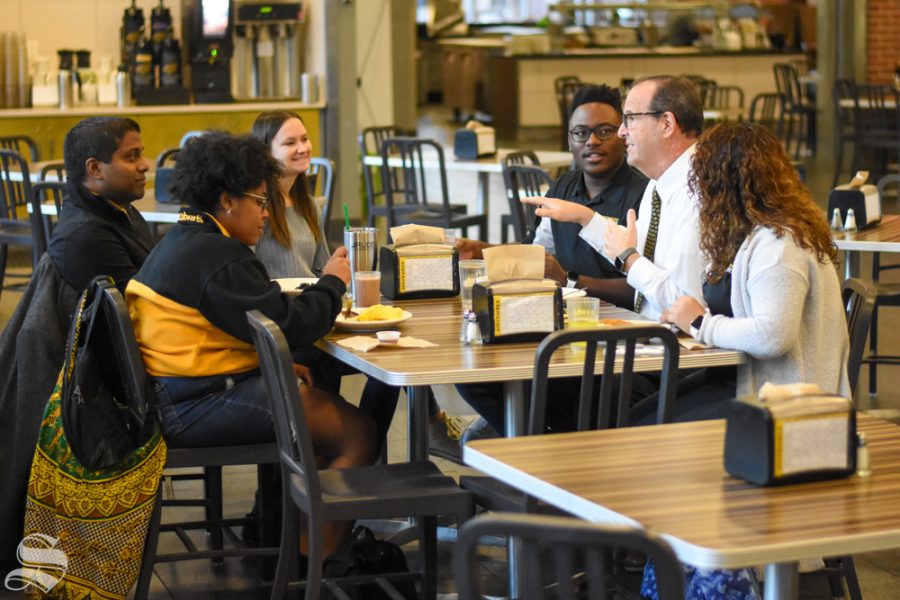 Wichita+States+new+president+Jay+Golden+eats+breakfast+on+Tuesday+at+Shocker+Hall+with+community+stakeholders%2C+including+a+group+of+Diversity+Interns+and+Bobby+Gandu%2C+assistant+vice+president+and+director+of+undergraduate+admissions.+Golden+was+named+the+14th+president+of+WSU+in+October.