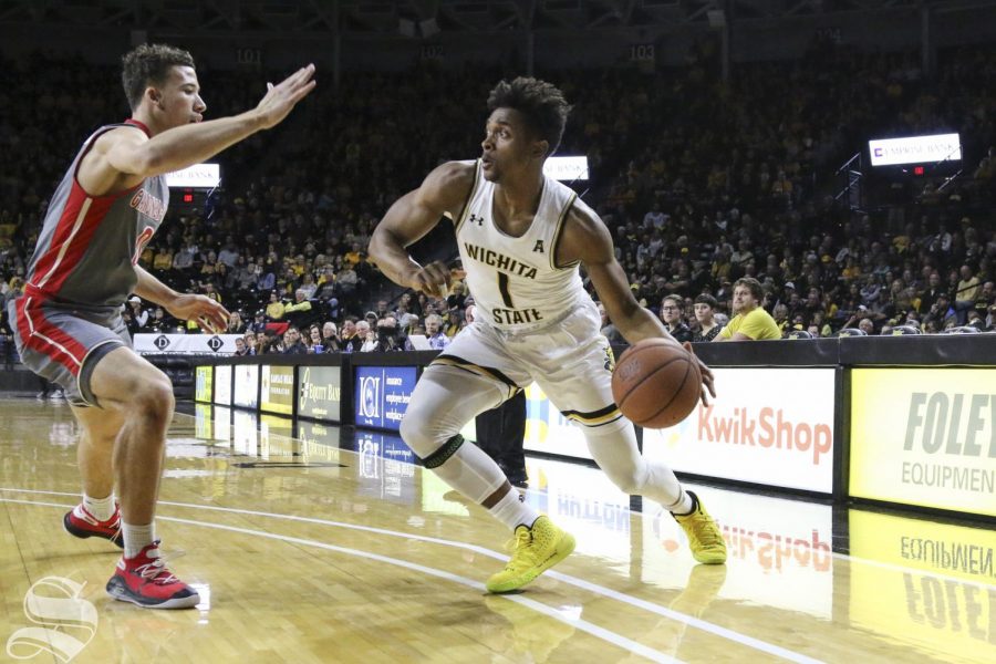 Wichita State freshman Tyson Etienne looks to drive the ball past Gardner-Webbs defense on Tuesday, Nov. 19, 2019, at Charles Koch Arena. 